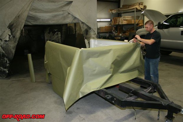 Sun Valley Bumper is a Rhino Lining dealer. Here, the trailer is being prepped for spraying in the lining. 