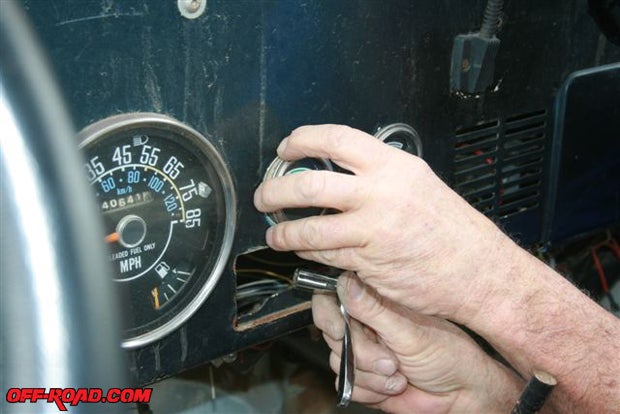 Then the voltmeter and oil pressure gauges were removed.