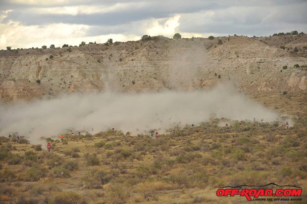 Minutes before the banner dropped, the sky turned cloudy and dark and rain started falling, though it wasnt enough to keep the dust down as the first wave started. Casellis line (left side of photo) got him the holeshot and he stayed out front the rest of the way.