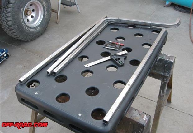 The first step is to lay out the rack on a worktable or sawhorses to make sure the newly designed bracket fits properly.