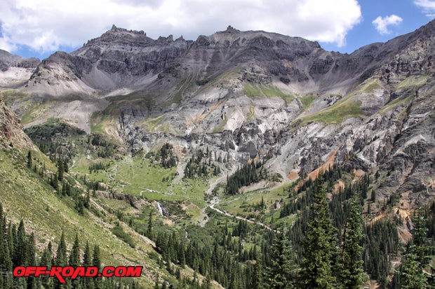 Tight and narrow trails climb along the majestic peaks of Yankee Boy Basin and Governor Basin, not far from Imogene Pass trail. This area is lined with pine, aspen and colorful alpine flowers. Its one of Ourays most popular off-road areas.  (Photo Elizabeth Hernandez).