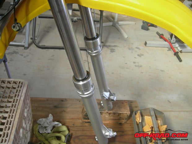 With both fork tubes in place we were able to rotate them in the triple clamps to get the proper alignment.