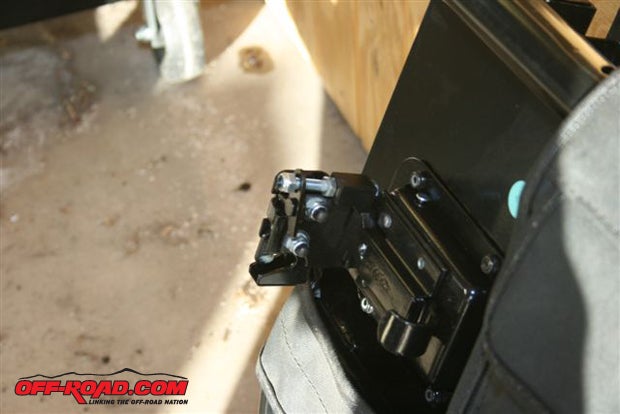 While the latches of the front doors are faced downward. Do not tighten a latch until youve made sure the latch matches the Jeeps striker (there is some adjustment built into the mounting design).