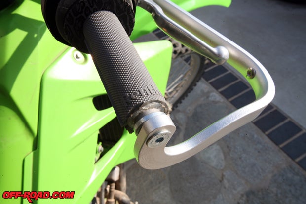 Once youve found the right place for the middle bar mount for the hand guard frame, tighten the bar end.