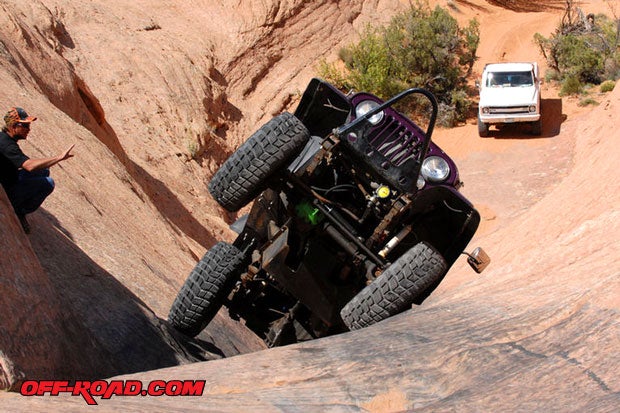 Hells Gate is a very challenging obstacle.  This Jeep CJ-5 got up on three wheels as the happy footed driver accelerated until finally rolling it on its side. Nobody was hurt, just some rock rash.
