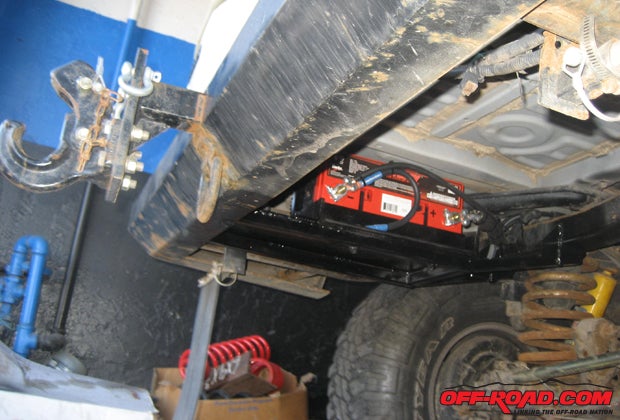For mounting the unit, we turned to a local shop in Logan, Utah, Custom Muffler and Auto Fabrication to help fabricate a heavy-duty bracket for us to mount the 31-PC2150 in the stock spare-tire location under the Landcruisers body. 