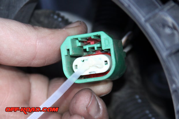 Apply some di-electric grease, provided by IPF, on the female side of headlight plug.