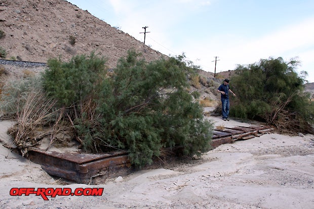 Kevin takes a closer look at the old railroad boxcar that has now become part of the landscape surrounding the Mojave River and Afton Canyon, creosote bushes and all.