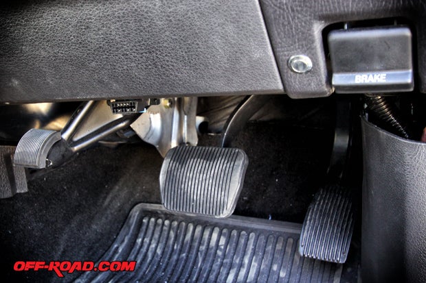 RHD USA uses factory Ford gas, brake and emergency brake pedals in their right-hand-drive conversions. They also re-route the OBD-II plug and e-brake release lever to the new driver side.
