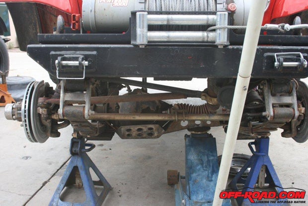 Make sure the Jeeps front end is safely supported before stripping out its components.