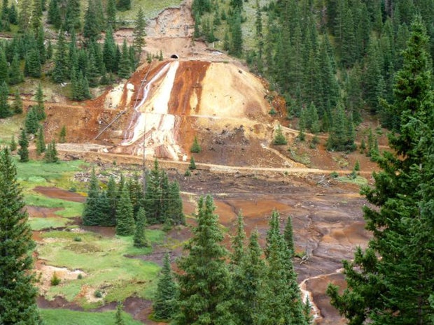 Dont be fooled into thinking this image shows a sudden disaster.  This is decades and decades of stained earth, at another portal.  Poke a hole in a mountain and itll leak mountain juice. Photo: YourColoradoWater.org, August 6, 2015.
