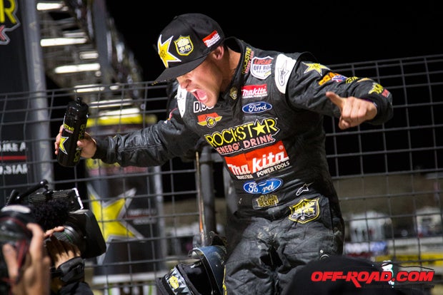 Brian Deegan gets fired up for the cameras after his Pro Lite win Saturday night.