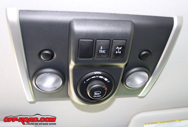THE CRAWL system on the FJ Cruiser is controlled via a speed dial mounted on an overhead control panel on the roof. The CRAWL system provides uphill and downhill speed control in 1/2-mph increments (there are five settings). Much like the like the A-TRAC system that provides additional power to the wheel with traction, the CRAWL system can only be operated in four-wheel-drive low.