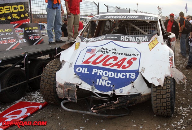 Carl Renezeder's hood exemplifies just how rough this race was. Unfortunately Lucas Oil handed down a penalty for rough driving that moved him off the podium. 