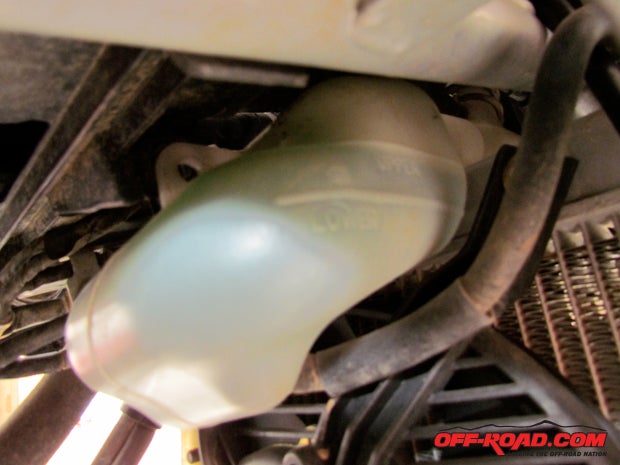 Check coolant levels along with cracked coolant lines. 