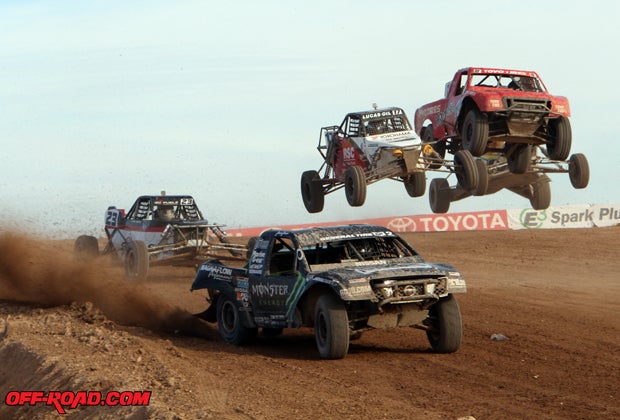 Casey Currie tries to keep other Pro Lite trucks and open-wheel buggies at bay during the race. 