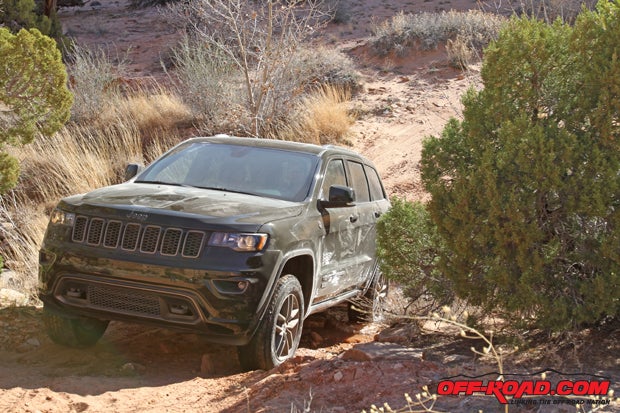 The eep Grand Cherokee's air suspension system lifts the SUV off the ground so it can safely tackle moderate obstacles. 