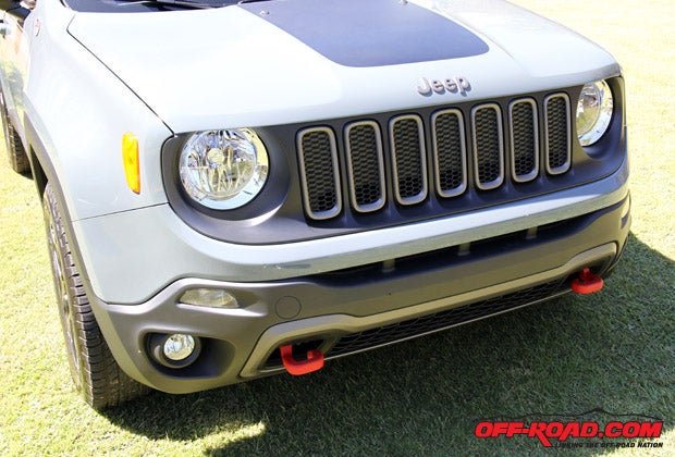 The frontend of the Renegade keeps the 7-slot grille styling for which the Jeep brand is known, while the Trailhawk package offers red tow hooks should they be needed when off the trail. 