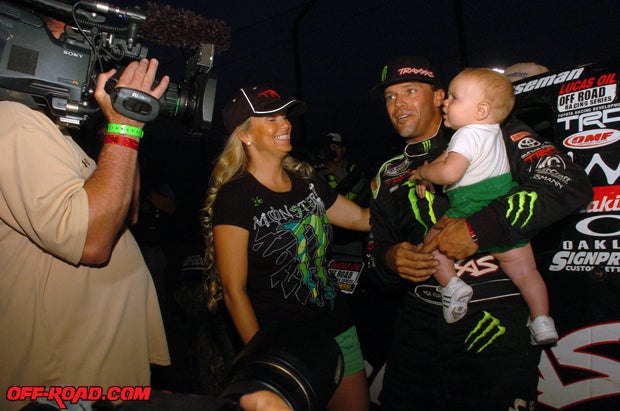 Rick Huseman talks to reporters with wife and son after his win on Saturday night at Round 9. He followed up the win with a hard-fought second place at Round 10. 