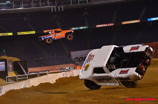 Justin Lofton gets it up on two wheels as Robby Gordon jumps the gap in SST. 