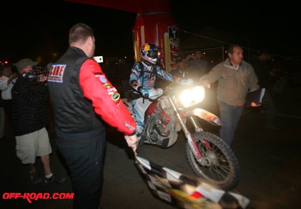 Kendall Norman crosses the finish line to earn the overall motorcycle win at the 2010 Tecate SCORE Baja 1000. No bike was within two hours of he and teammate Quinn Cody. 