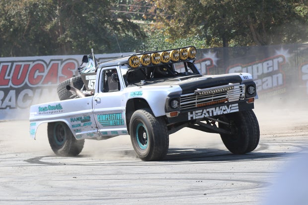 Chris Isenhouer's 1969 Ford F-150 pre runner was jumping dirt tabletops and running circles while lighting up the tires for the fans inside the Lucas Oil proving grounds at OFF-ROAD EXPO.