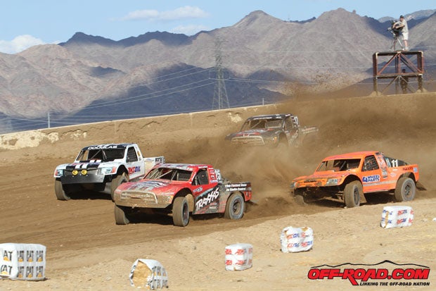 The Pro 4 field wraps around turn one of the high-speed Primm Valley course. 