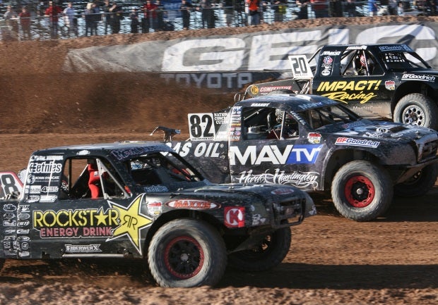 Three wide: Brian Deegan (left), Chris Brandt (middle) and Matt Loiodice all battled for the Pro Lite win. 