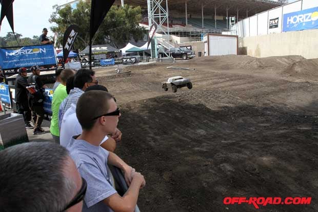Short-course RC cars in action. 