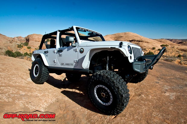 The Recon is really a showcase of available and prototype parts from Mopar. A few key prototype parts include a 4.5-inch Stage III Long-Arm kit, Dana 60 front and rear axles, and a Stinger performance front bumper based on the 10th Anniversary Rubicon bumper. Oh yeah, its powered by a 6.4-liter HEMI crate engine that is currently available in the Mopar catalog. 