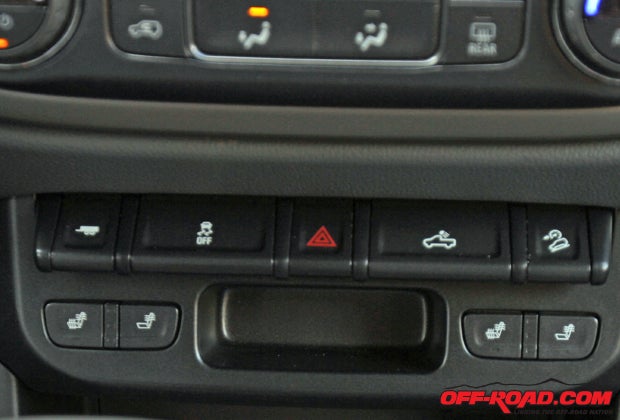 The piano-key switches at the base of the Colorados center stack is well laid out and features switches for Tow Mode, traction control, Hill Descent Control, the truck bed lighting and hazard lights. 