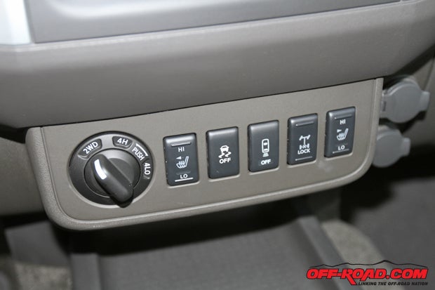 At the base of the Frontiers center stack is an easy-to-use twist knob to control 2WD, 4H and 4LO. Just to its right are switches for driver and passenger heated seats, traction control, the differential lock for the rear axle and the on/off switch for the backup sensors. 