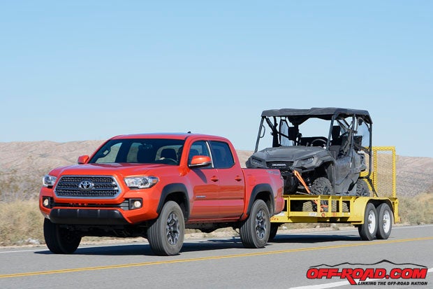 The Toyota Tacoma tows just fine overall, but it falls short fo the GMC Canyon in pulling power and we wish it had a tow/haul setting for more ideal shift timing when loaded. Photo: Scott Rousseau