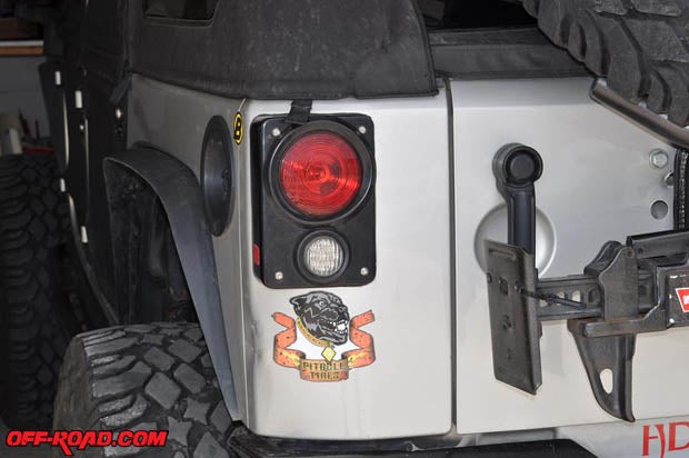 The steel taillights mount very securely with four bolts.