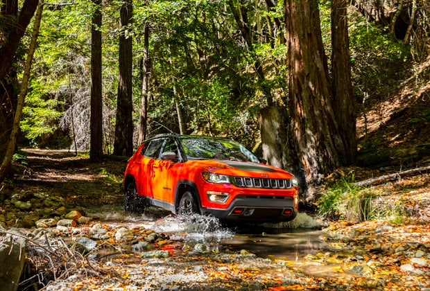 The Jeep Compass Trailhawk sits 1 inch higher than the standard Compass and has improved approach, departure and breakover angles.