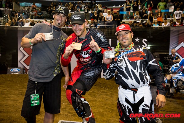 Mike Schultz (center) stands on the podium with silver medalist Todd Thompson (left) and Chris Ridgway (right) at the 2013 X Games. Photo: ESPN/Garth Milan