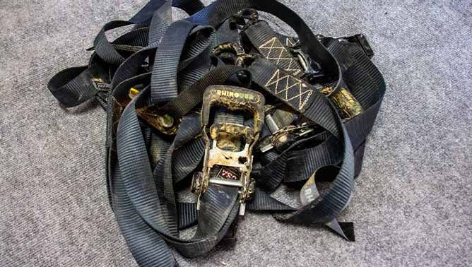 pile of dirty ratchet straps