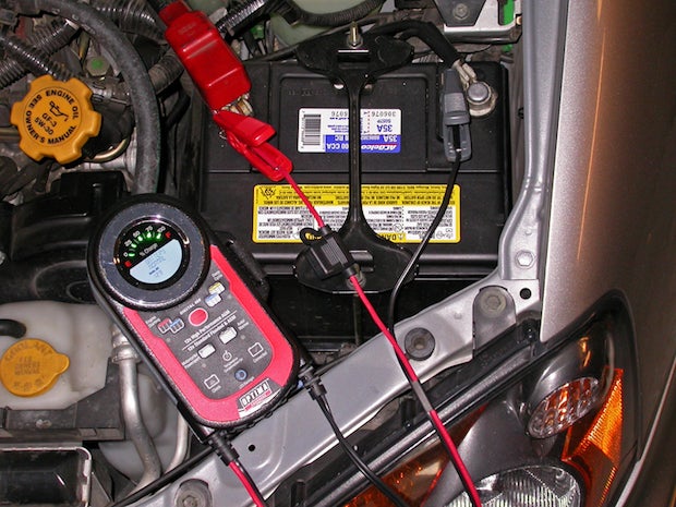 OPTIMA's smaller "400" battery maintainer can be parked underhood without being underfoot.