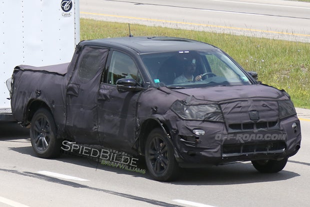 Spy photographers captured the new Ridgeline during testing earlier this year. Although heavily covered, this is the best look we've had at the new Honda truck. Photo: Brian Williams