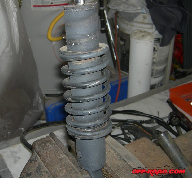 Springs were removed in order to get to the body and shaft of the shocks.