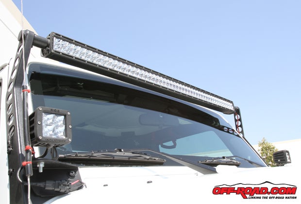 A 50-inch Rigid Industries E Series LED lightbar provides clear vision on dark trails. A Rigid Industries 4-LED light is also mounted to each side for additional light.