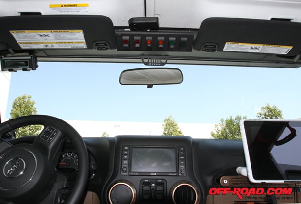 Inside the cab, Spod controls are mounted above the dash, while the Zeotronix LED display provide vehicle diagnostics. A iPad mount is fitted on the passenger side, and AC vent bezzles provide an added color accent.