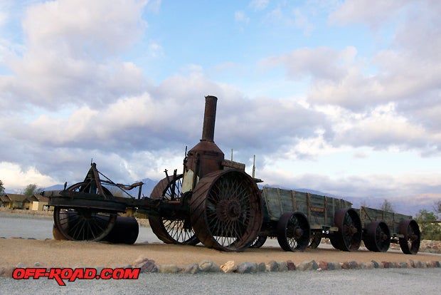"Old Dinah" -- Steam tractor and ore wagons (circa 1894) were used to haul borax in Death Valley from the Old Borate mine. This contraption and other mining machinery are on display at Furnace Creek Ranchs Borax Museum.