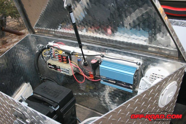 Inside the aluminum toolbox are the battery ($249), inverter, fuse box, and 120VAC connector and cord.