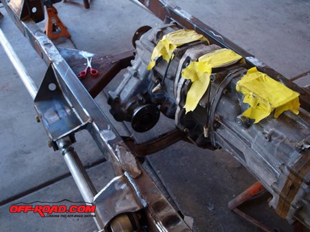 The dual transfer cases were dropped home and rested on a new cross member.