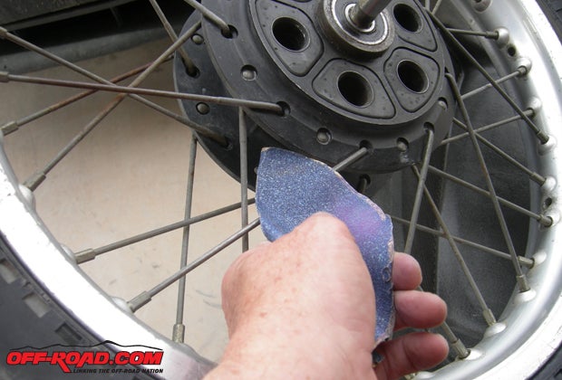 Good tip: Use a piece of sandpaper to get any rust off the spokes that you might find. On most older bikes, you are going to find a little bit of surface rust which shouldnt be a real problem.