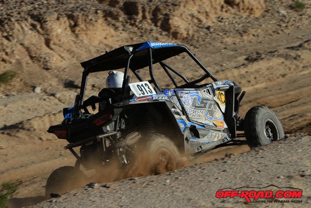 Branden Sims had enough left over after winning the Walker Evans Desert Championship race to tape off the one on his number plate and run his then number 913 in the Production race. He finished 21st.