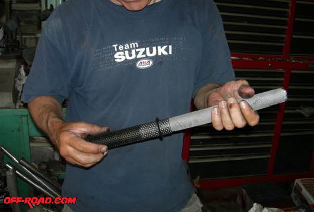 The core from an old Husky muffler was the same size as the KDX 200.