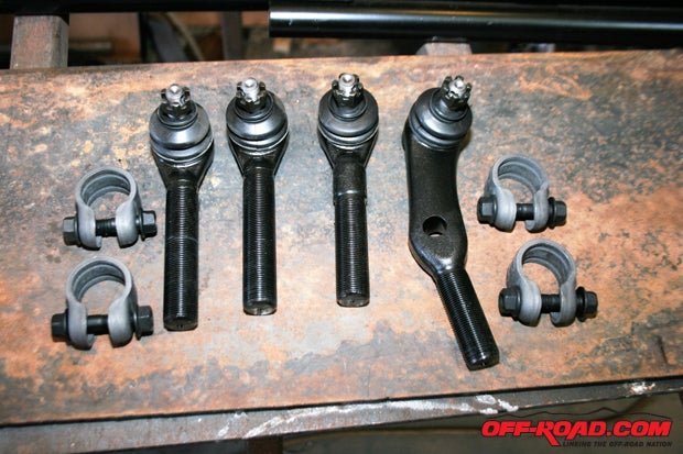 Two tie rod ends have standard right-hand threads, so you screw them in clockwise. The other two ends are threaded in counterclockwise.