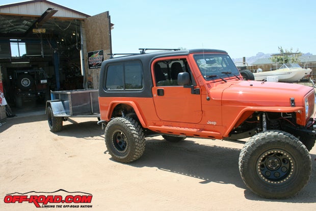 Beautiful and ready to get dirty, the Jeep is pulling its camping trailer. Maaco gives you an instruction sheet on how to protect your new paint job.